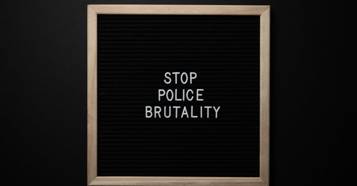 Is it possible to change powers without pausing? - Overhead view wooden frame with white inscription about social injustice on black background