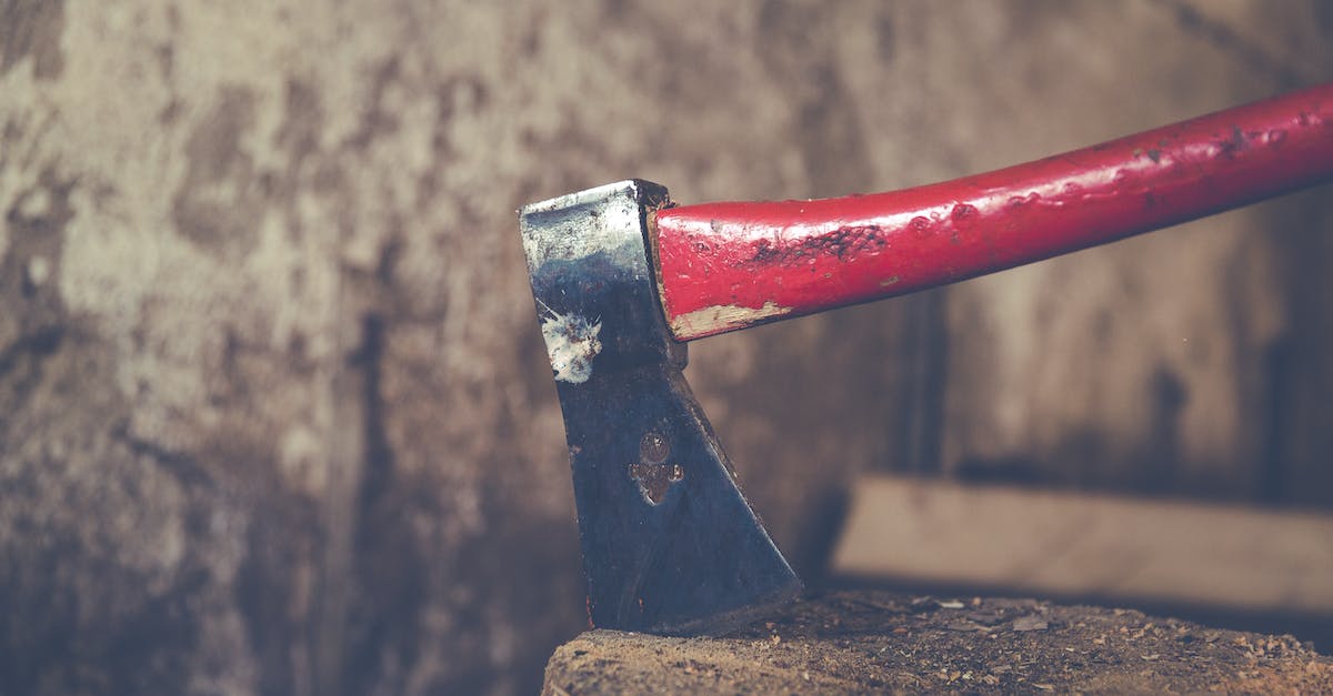 Is it possible to chop down trees? - Red and Black Metal Tool