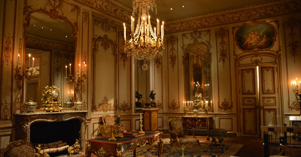 Is it possible to circumvent European censorship? - Brown Wooden Coffee Table Below an Uplight Chandelier