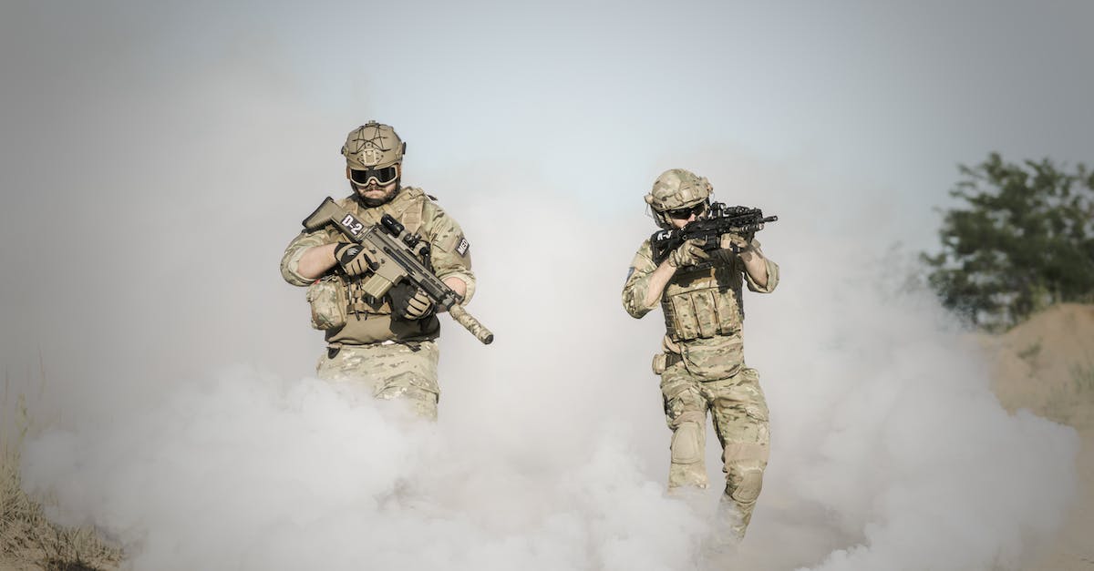 Is it possible to do a bow attack and not be adjacent to enemy in Battle for Wesnoth? - Men Holding Rifle While Walking Through Smoke Grenade
