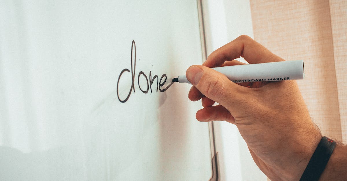Is it possible to do a job with someone who has already done it? - Crop unrecognizable male coach writing done word on whiteboard during presentation in light office Is it possible to do a job with someone who has already done it? - Crop unrecognizable male coach writing done word on whiteboard during presentation in light office