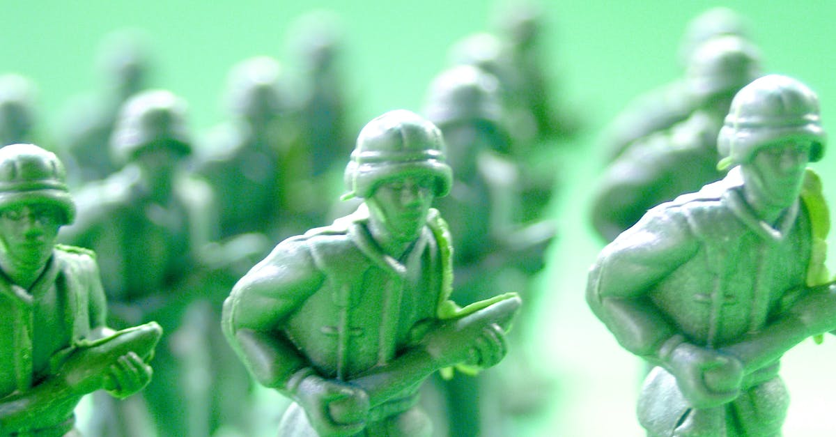 Is it possible to fire a weapon through logic? - Soldier Toy Selective Focus Photography