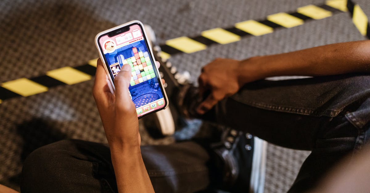 Is it possible to get Platinium in closed-server games with online multiplayer trophies? - Close-Up View of a Person Playing Mobile Game Is it possible to get Platinium in closed-server games with online multiplayer trophies? - Close-Up View of a Person Playing Mobile Game