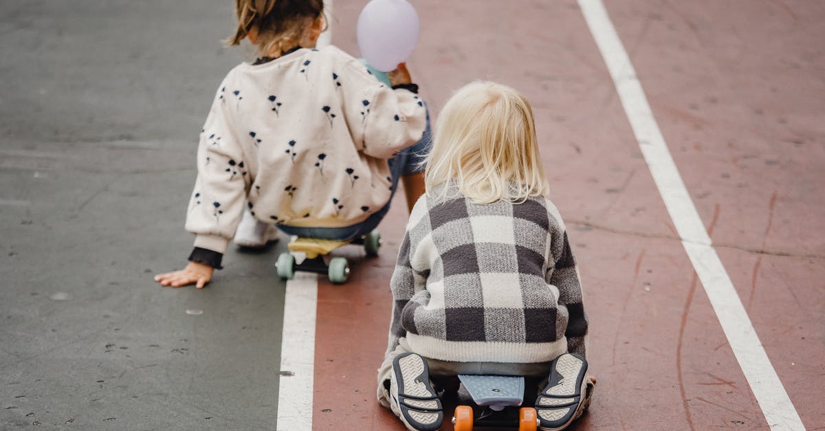 Is it possible to have more than one provisioning effect active at the same time? - Faceless children sitting on skateboards on asphalt road