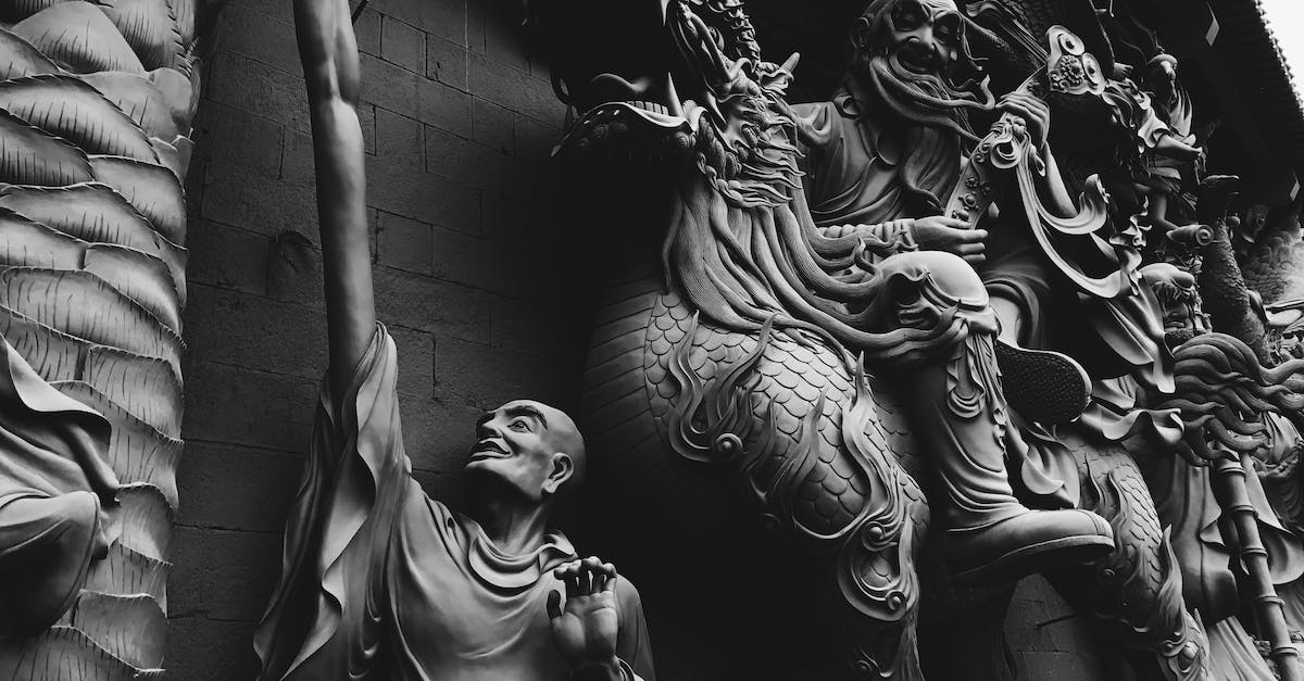 Is it possible to merge the ender dragon and wither? [closed] - Grayscale Photo of Statues