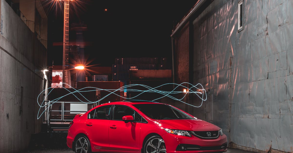 Is it possible to model real cities in the new Cities: Skyline? - Shiny red car near shabby buildings at night