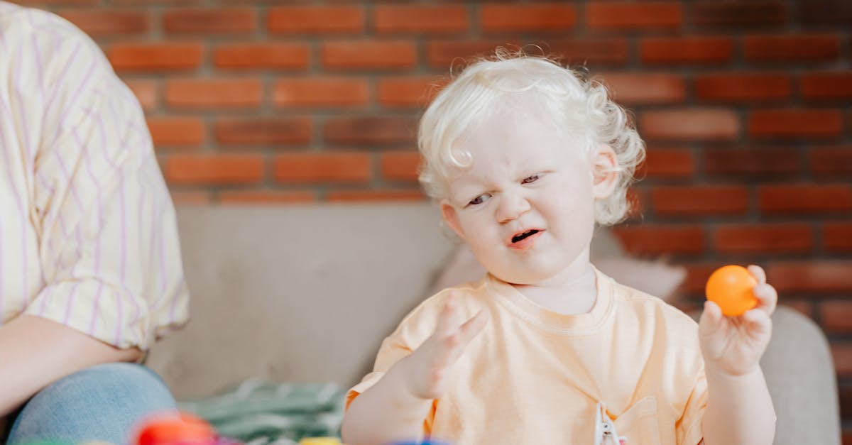 Is it possible to obtain more Lanius crew? - Baby in Yellow Shirt Sitting on White Textile
