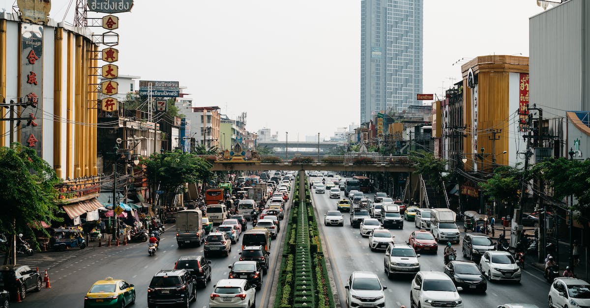 Is it possible to pause Zombie Highway 2? - Cars on Road Near High Rise Buildings