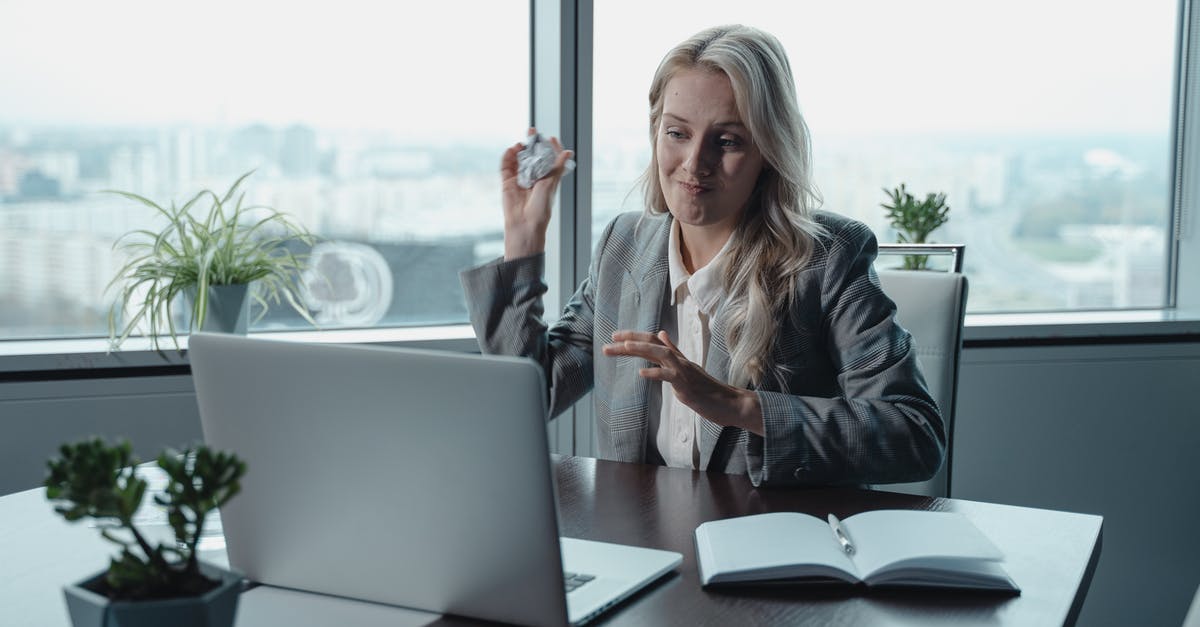 Is it possible to play CEO and VIP stuff in a lobby with only organisation members? - Woman In Gray Coat Sitting By The Table Using A Laptop Is it possible to play CEO and VIP stuff in a lobby with only organisation members? - Woman In Gray Coat Sitting By The Table Using A Laptop