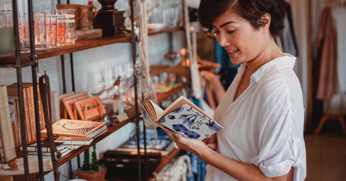 Is it possible to purchase characters before I complete story mode? - Gorgeous Asian young lady reading novel in vintage boutique