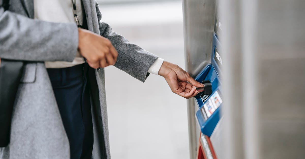 Is it possible to transfer MissingNo. and other Gen 1 Glitch Pokémon to the PokéBank? - Faceless woman buying metro ticket via electronic machine