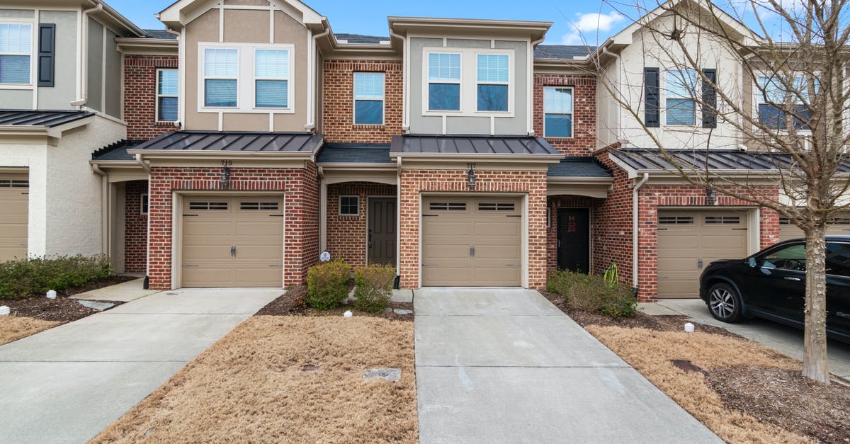 Is it possible to upscale a windowed game? - A Brick Adjacent Houses with Brown Garage Doors