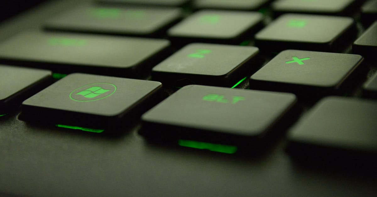 Is it possible to upscale a windowed game? - Close-up Photography of Black and Green Computer Keyboard Keys