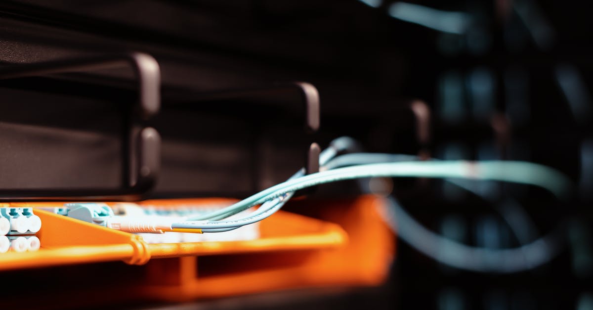 Is it possible to use multiple keyboards? - Blue wires connected to contemporary electronic equipment with multiple inputs on blur background Is it possible to use multiple keyboards? - Blue wires connected to contemporary electronic equipment with multiple inputs on blur background