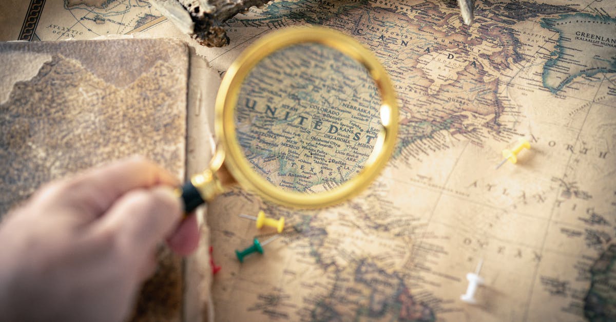 Is it possible to zoom map? - Person Holding Magnifying Glass