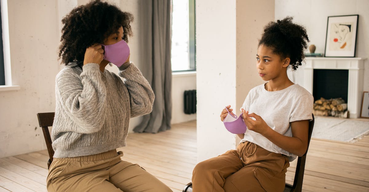 Is it safe to abandon a child when moving in with your husband? - Black mother and daughter taking off medical masks Is it safe to abandon a child when moving in with your husband? - Black mother and daughter taking off medical masks