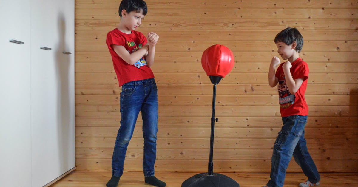 Is it still possible to play AOE2: The Age of Kings over a LAN? - Boys playing with punching bag on stand in boxing club