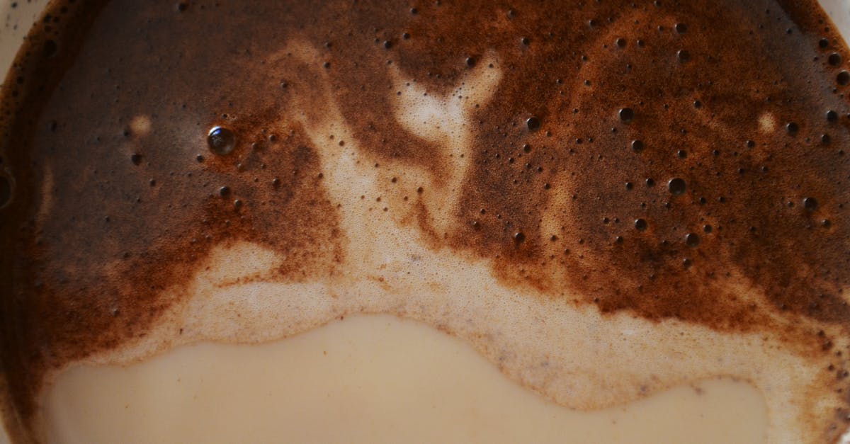 Is Liquid Ocelot a brother to Liquid Snake? - Brown and White Liquid on White Ceramic Bowl Is Liquid Ocelot a brother to Liquid Snake? - Brown and White Liquid on White Ceramic Bowl