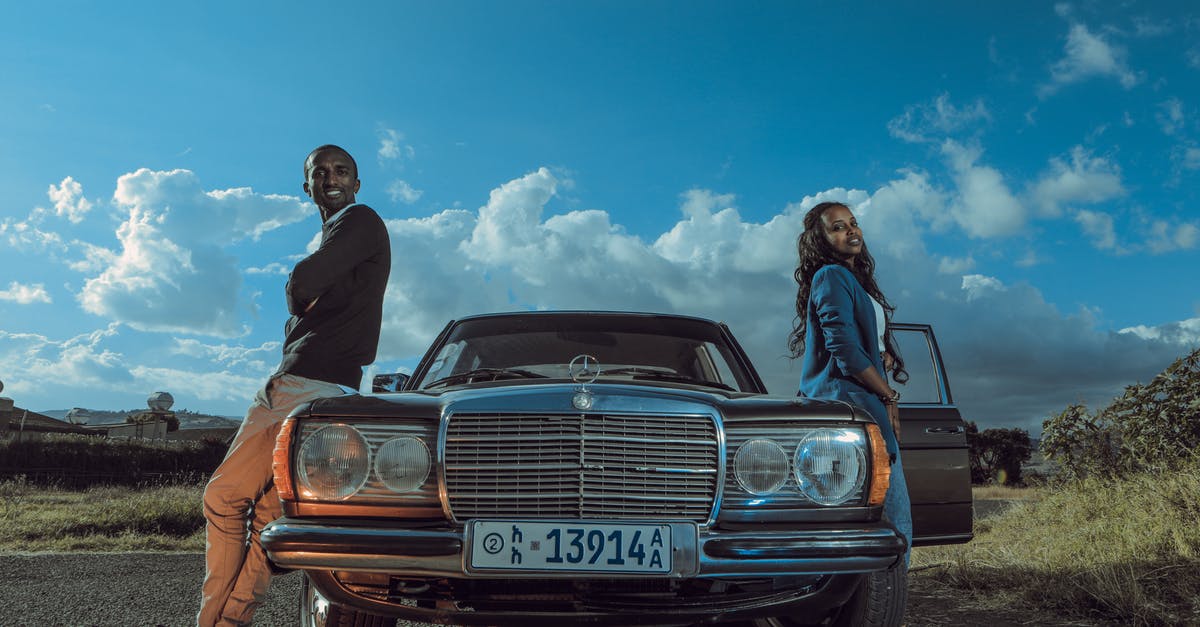 Is loot relative to your agents level or to the zone you're in? - Stylish black couple standing near retro car in countryside