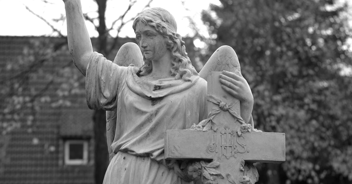 Is Malthael the Angel of Wisdom? - Grayscale Photo of Angel Statue