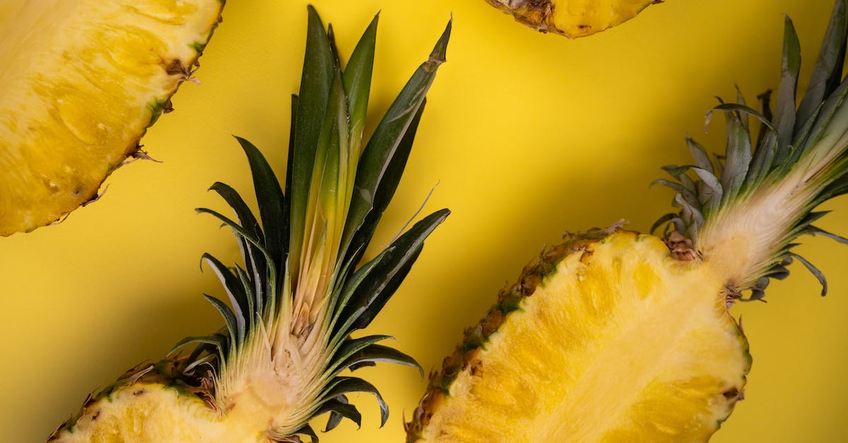 Is Octarine Core worth it on Kunkka? - Overhead view of yummy cut pineapples with sweet flesh and wavy leaves on yellow background Is Octarine Core worth it on Kunkka? - Overhead view of yummy cut pineapples with sweet flesh and wavy leaves on yellow background