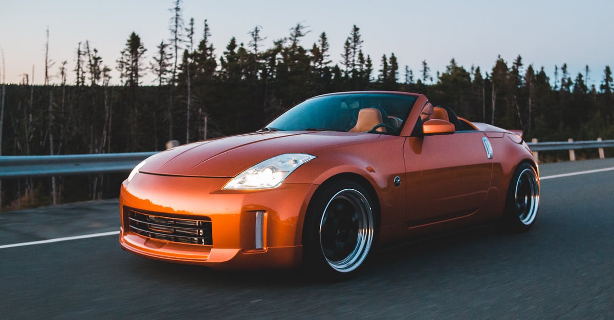 Is rank still a good indicator of personal skill with the new Dynamic Queue? - Expensive modern automobile with silver wheels driving fast on asphalt near green forest