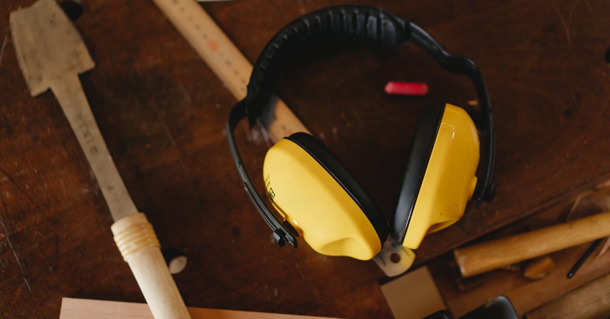 Is reload cancelling faster? - Protective headphones near carpentry tools on workbench Is reload cancelling faster? - Protective headphones near carpentry tools on workbench