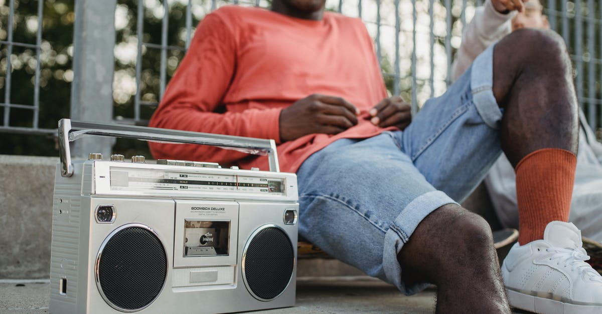 Is selecting Data0 really a point of no return? - Diverse friends chilling on street with vintage radio cassette recorder Is selecting Data0 really a point of no return? - Diverse friends chilling on street with vintage radio cassette recorder