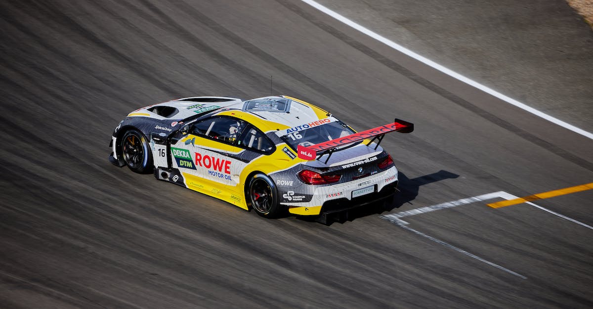 Is speed a factor in diagonal traversal? - Red and White Race Car on Track