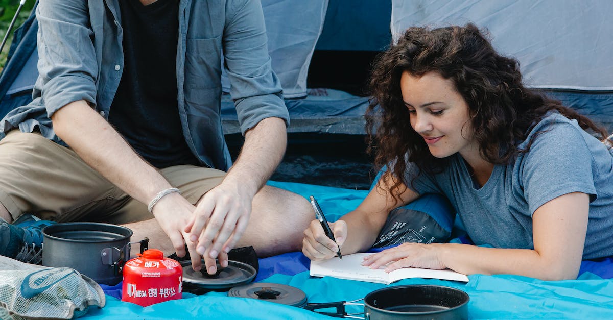 Is the area boss required for PVP to be active? - Travelers spending time in camping area near tent in daytime