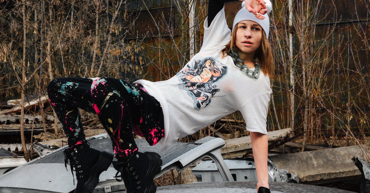 Is the area boss required for PVP to be active? - Full body of serious young female in activewear and hat dancing hip hop on abandoned car roof on autumn day