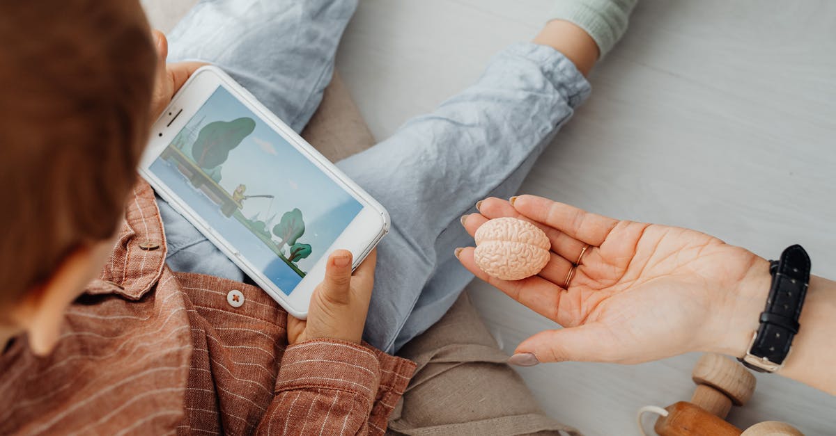 Is the Brain of Cthulhu a hard mode boss? - Person Holding White Ipad on Gray Textile Is the Brain of Cthulhu a hard mode boss? - Person Holding White Ipad on Gray Textile