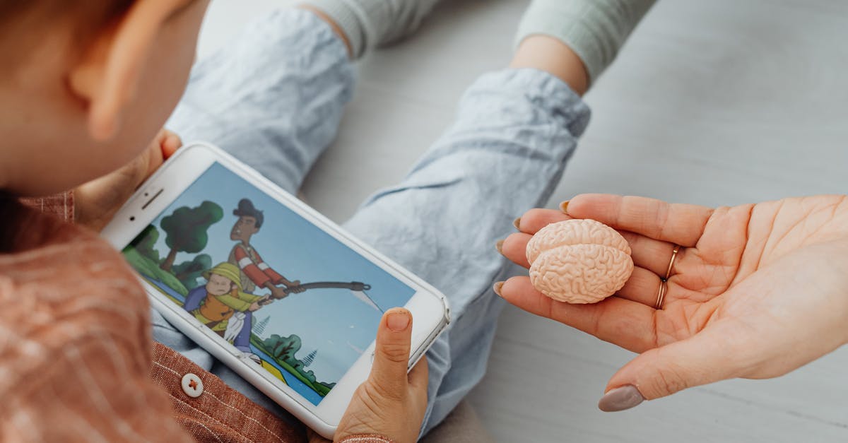 Is the Brain of Cthulhu a hard mode boss? - Person in White Long Sleeve Shirt Holding White Ipad Is the Brain of Cthulhu a hard mode boss? - Person in White Long Sleeve Shirt Holding White Ipad