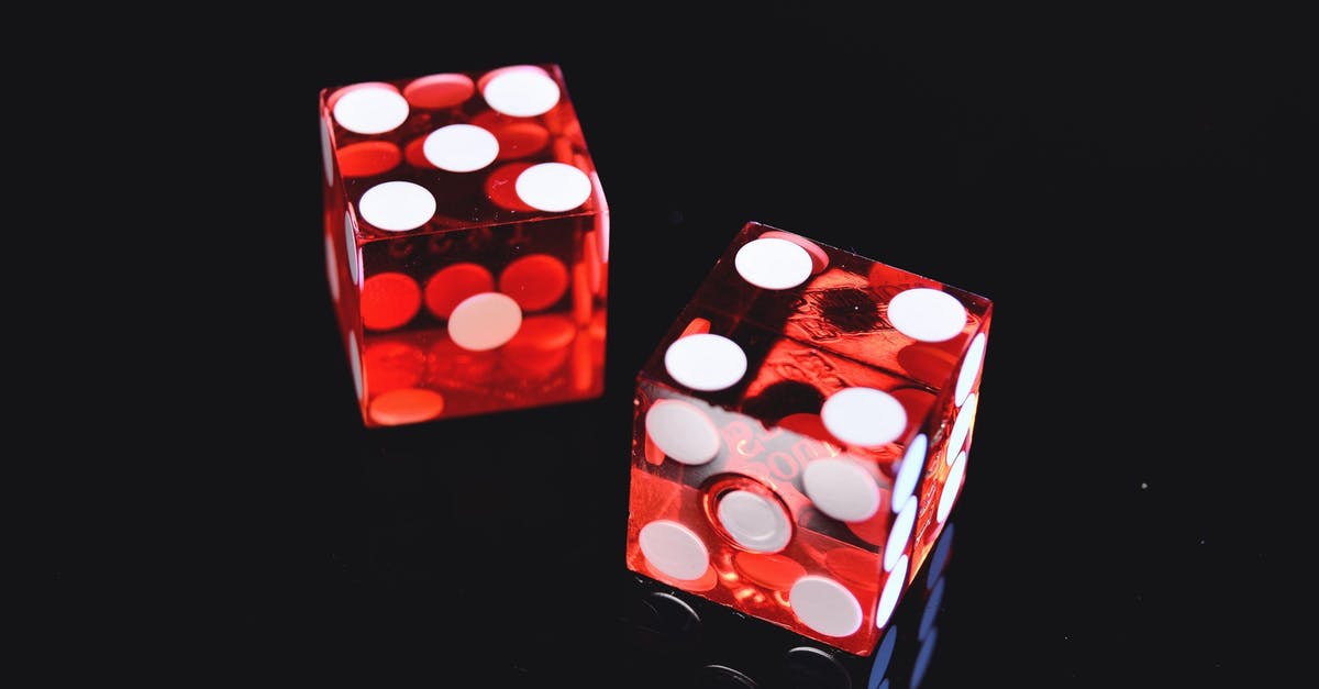 Is the computer cheating at Dice Poker? - Photo of Two Red Dices Is the computer cheating at Dice Poker? - Photo of Two Red Dices