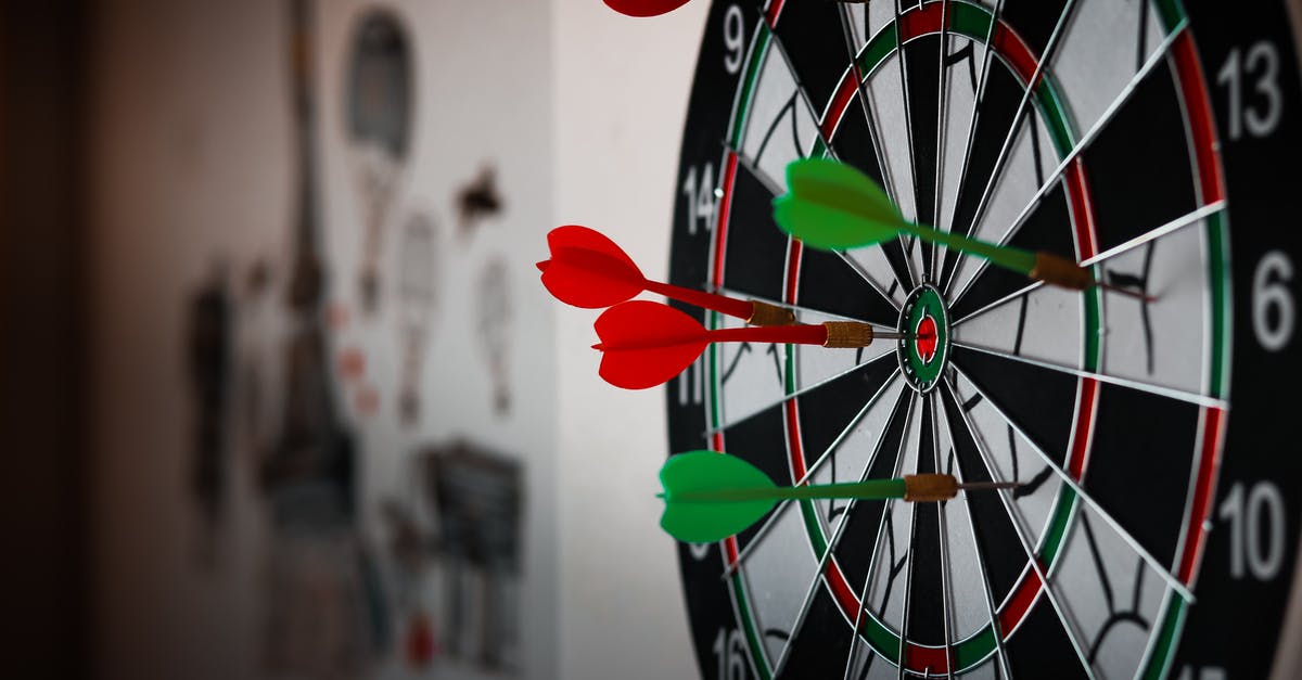 Is the darts minigame in the Final Fantasy VII Remake based on a real variant of darts? - Close-Up Photo of Dart Pins on Dartboard Is the darts minigame in the Final Fantasy VII Remake based on a real variant of darts? - Close-Up Photo of Dart Pins on Dartboard