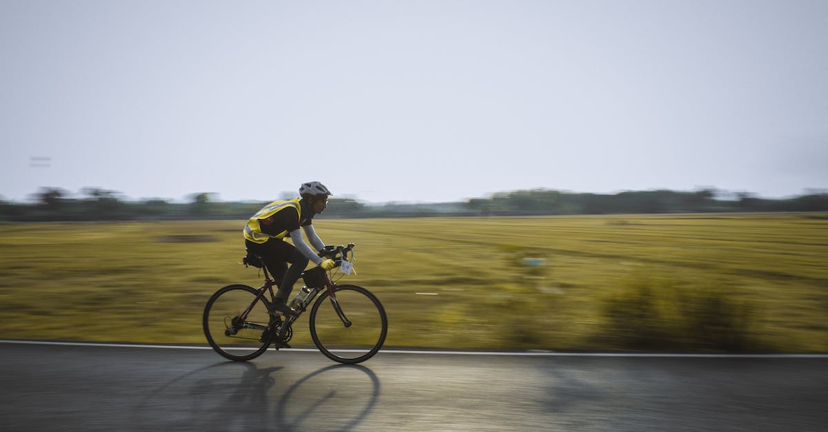 Is the day-night cycle purely cosmetic? - Sportsman riding bicycle on road in countryside