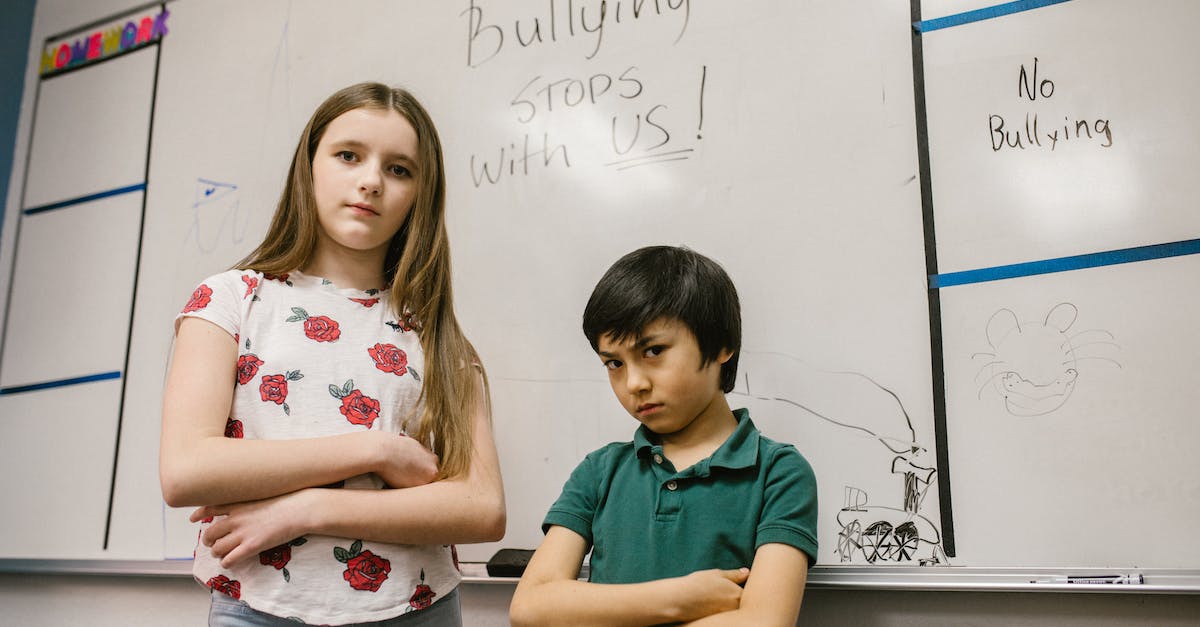 Is the name "Chell", "GLaDOS", or "Wheatley" ever explicitly stated? - Two Students Looking Angry at the Camera