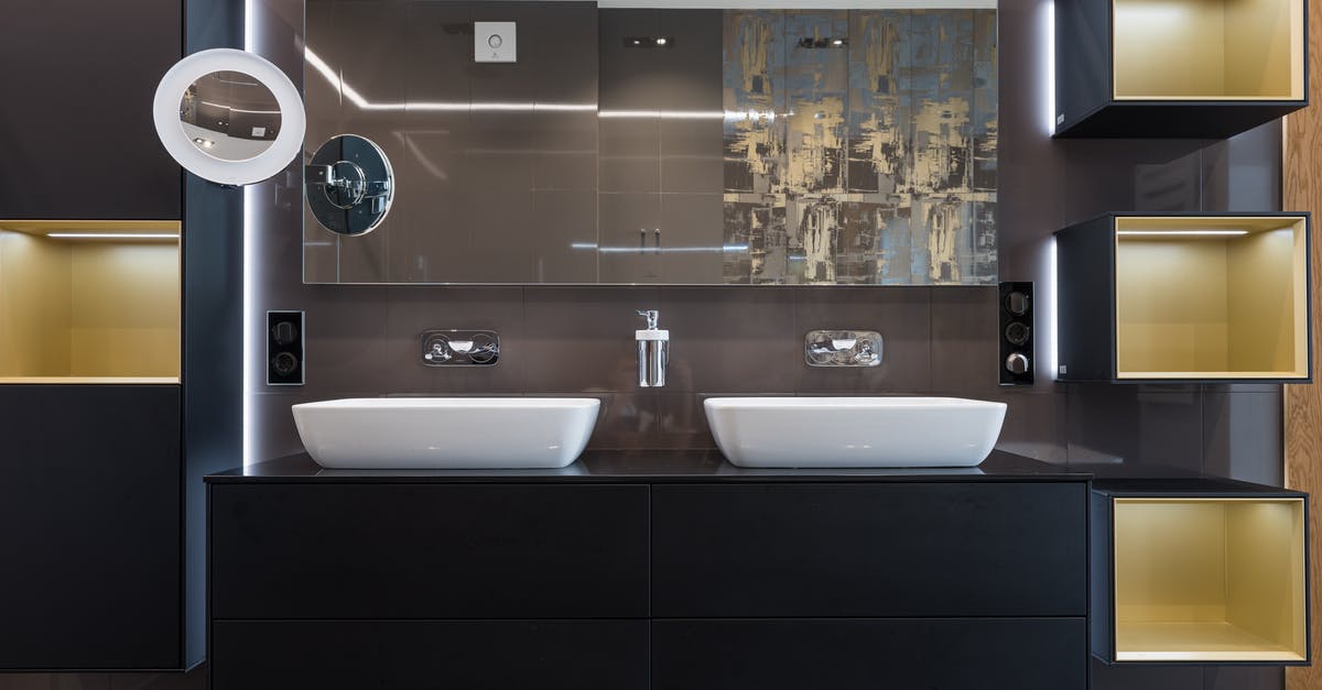 Is the new Feast mastery more impactful than Double Edged Sword? - White sinks placed on wooden cabinet in contemporary illuminated bathroom