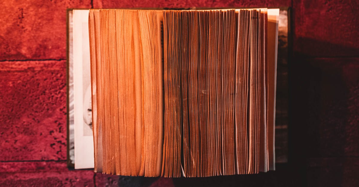 Is the runic writing in the Dark Souls series based on anything? - Book on Red Surface