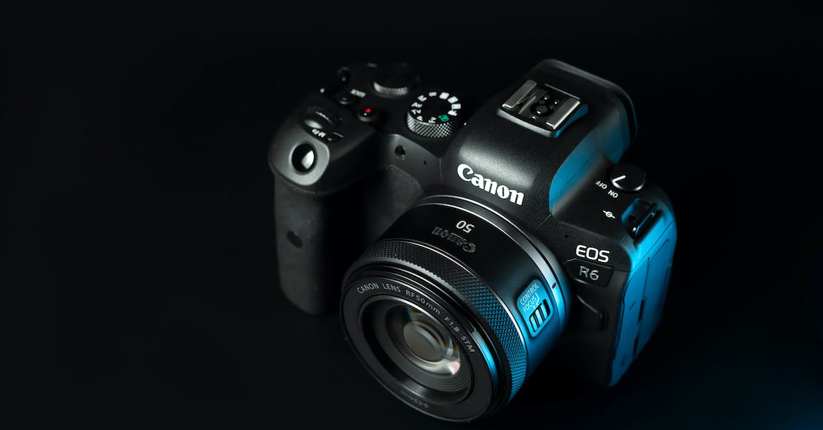 Is there a canon order for the main missions in Mass Effect? - Black Nikon Dslr Camera on White Surface