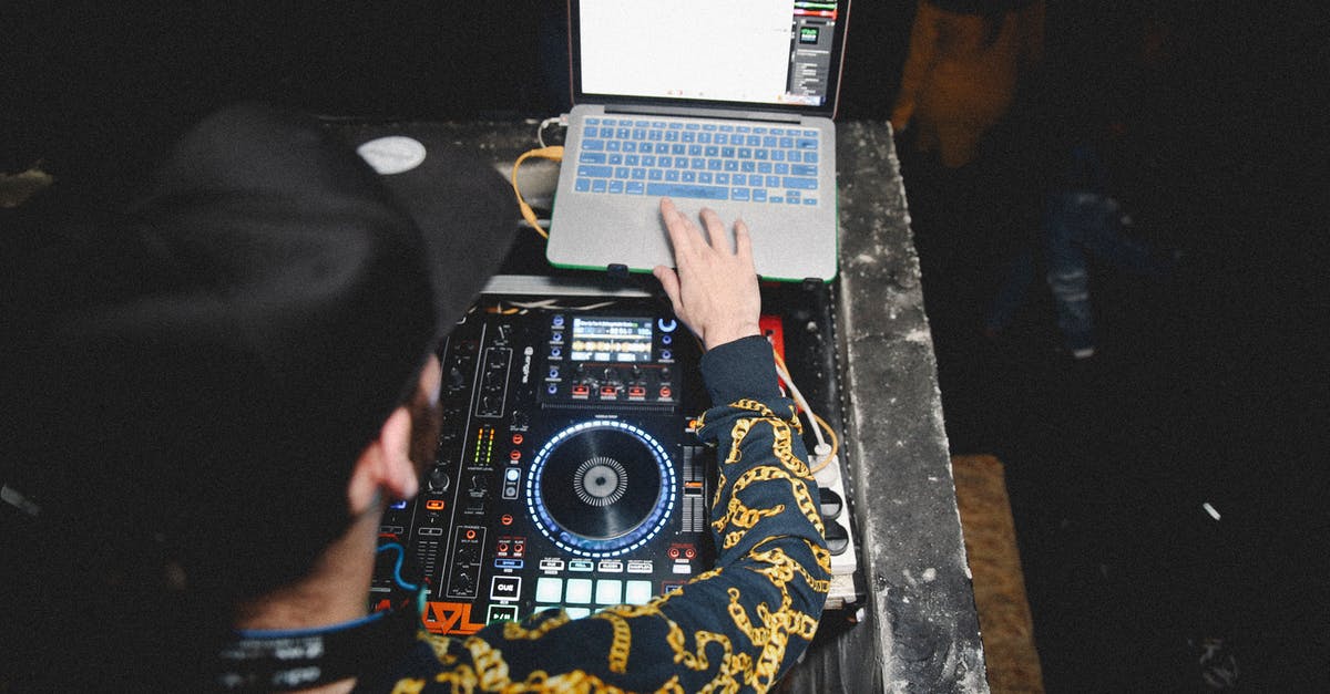 Is there a difference between the PC and Console versions of Assassin's Creed? - Person Using Black Laptop Computer