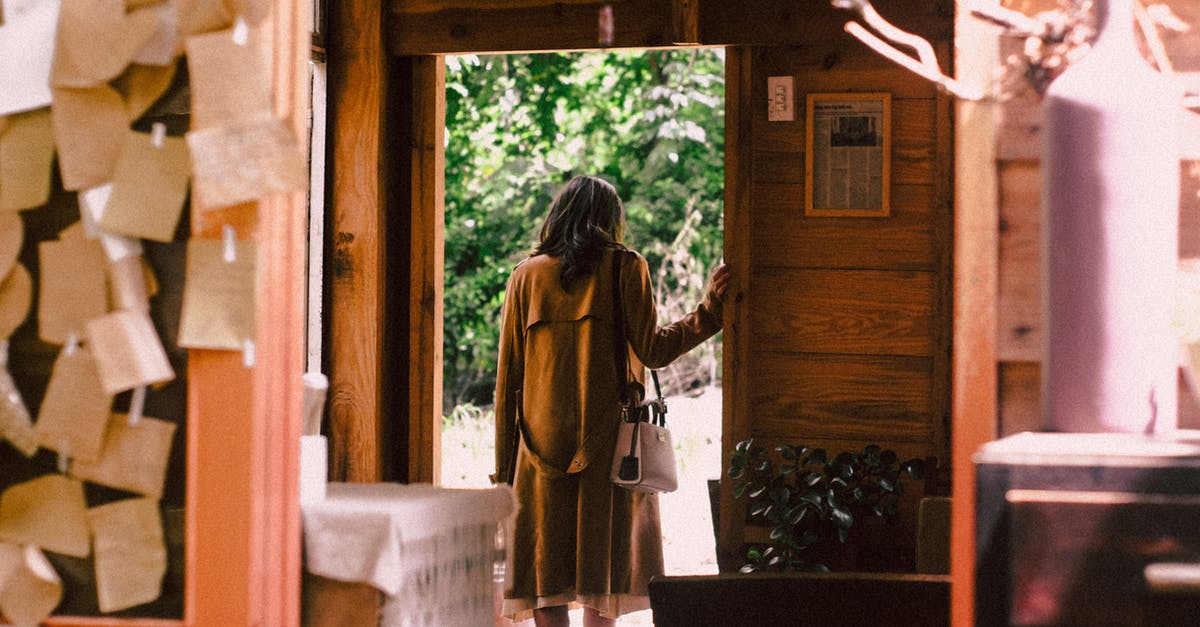 Is there a downside to leaving matches early? - Woman Standing Near Open Door About to Step Outside Is there a downside to leaving matches early? - Woman Standing Near Open Door About to Step Outside