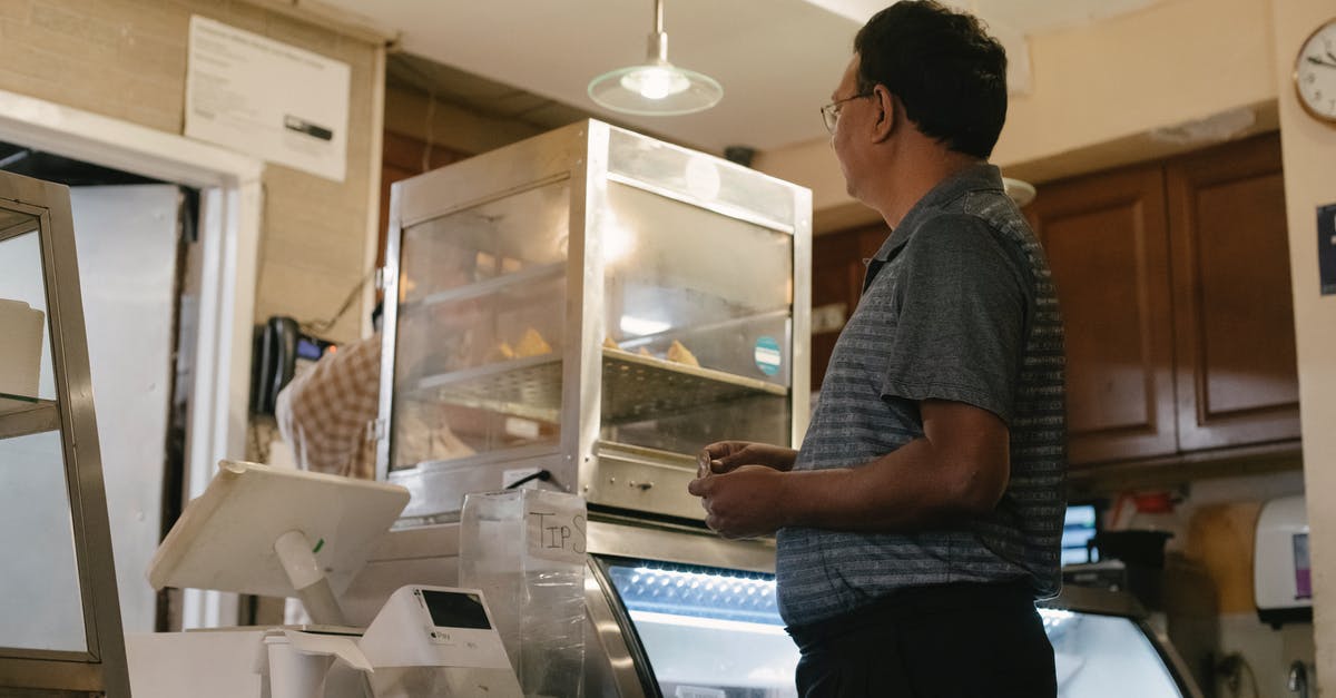 Is there a good counter to wedge + biggs combo? - Side view of ethnic male wearing casual clothes standing near showcase and cash register while buying food in grocery store Is there a good counter to wedge + biggs combo? - Side view of ethnic male wearing casual clothes standing near showcase and cash register while buying food in grocery store