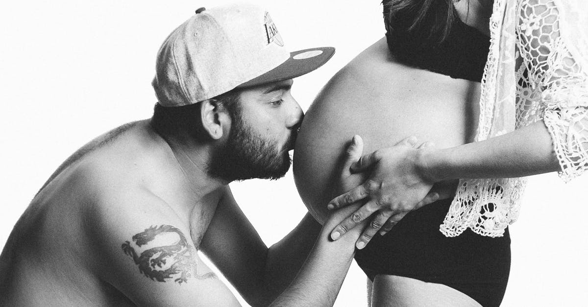 Is there a <10 relationship cap with bachelor/bachelorettes who aren't your spouse? - Grayscale Photography of Man Kissing Woman's Pregnant Bell