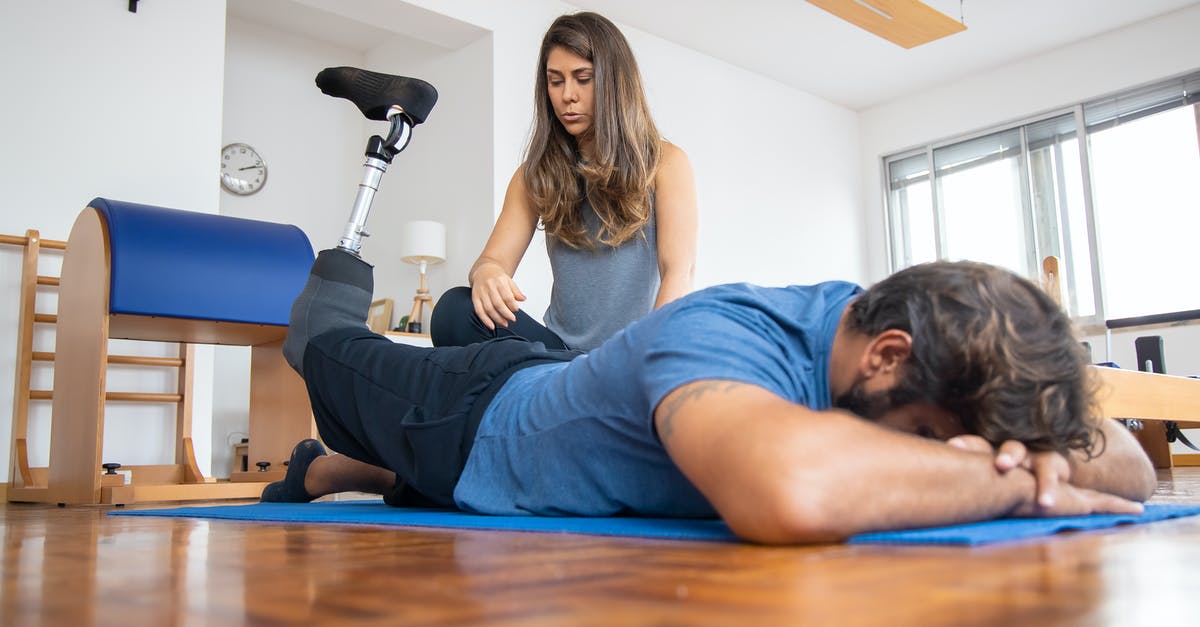 Is there a max trainer level in Magikarp Jump? - A Man Undergoing  Physical Therapy with Prosthetic Leg