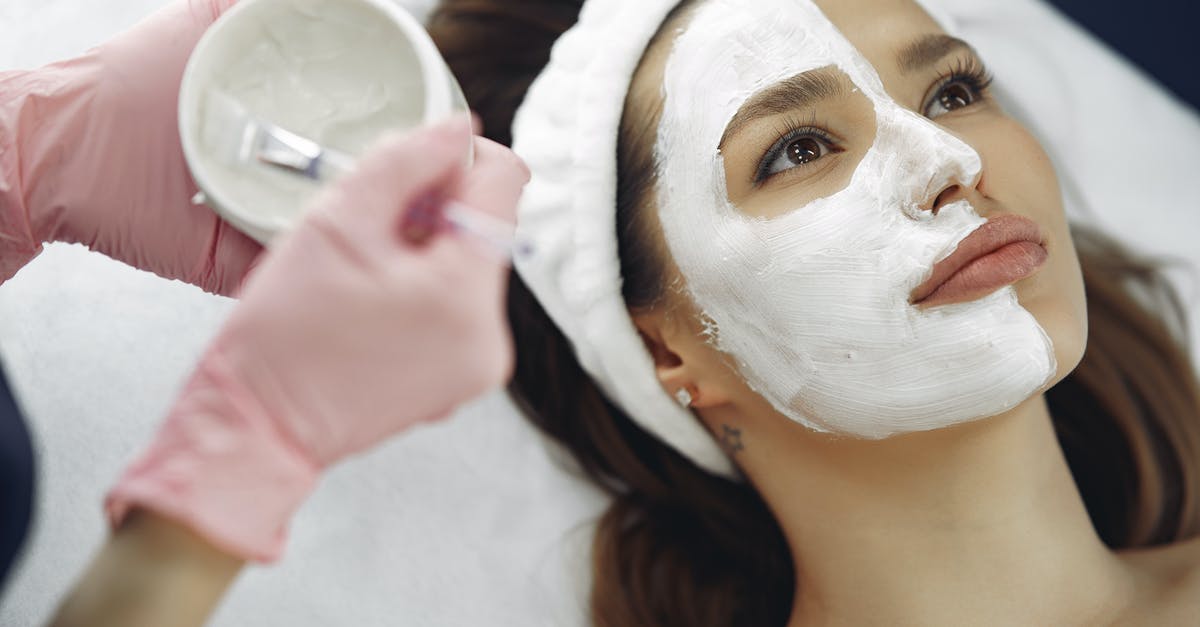 Is there a Minecraft Java client mod for managing inventory from another device? [closed] - Crop unrecognizable beautician applying clay mask to clients face