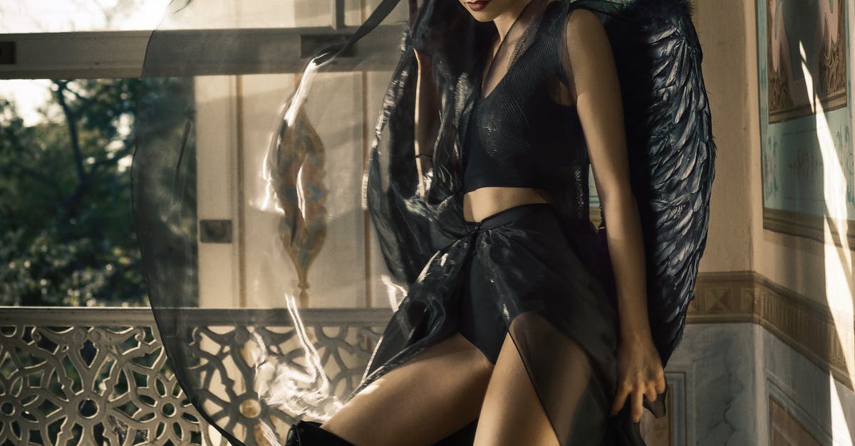 Is there a Photo Mode in Final Fantasy VII Remake? - Woman in Black Angel Costume Is there a Photo Mode in Final Fantasy VII Remake? - Woman in Black Angel Costume