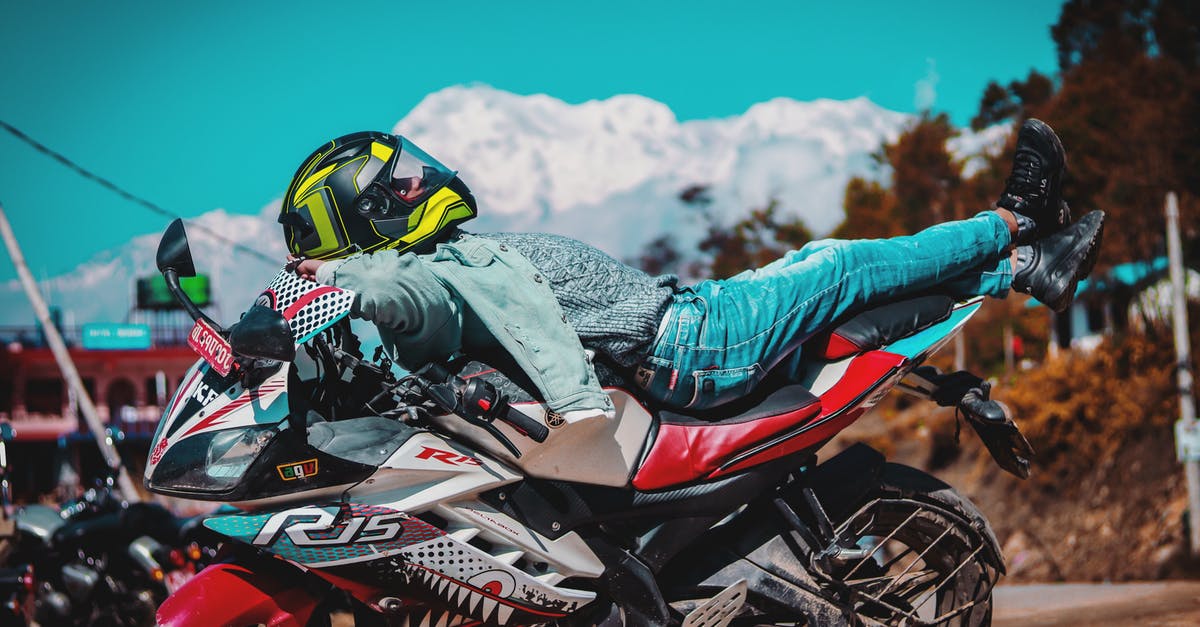 Is there a point to kicking the helmet down stairs and saving the guy? - Man in Green Jacket Riding Red and Black Sports Bike Is there a point to kicking the helmet down stairs and saving the guy? - Man in Green Jacket Riding Red and Black Sports Bike