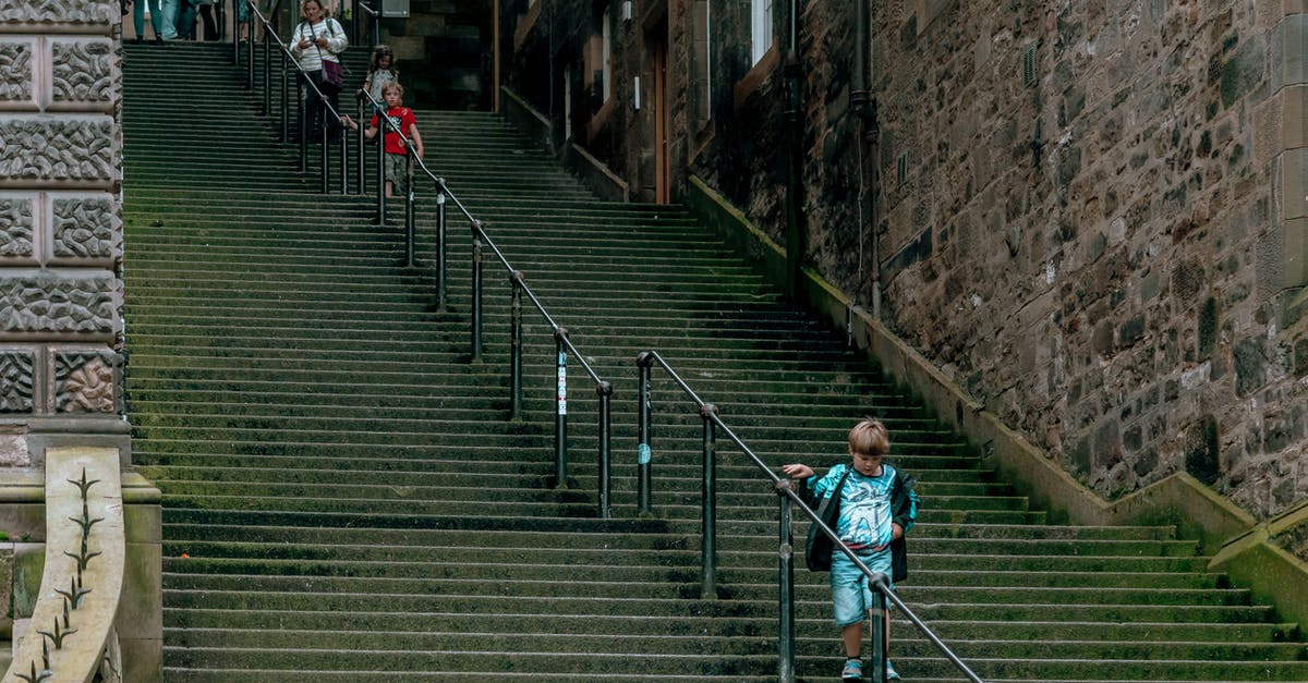 Is there a point to kicking the helmet down stairs and saving the guy? - Metal Handrails on Green Stairway Is there a point to kicking the helmet down stairs and saving the guy? - Metal Handrails on Green Stairway