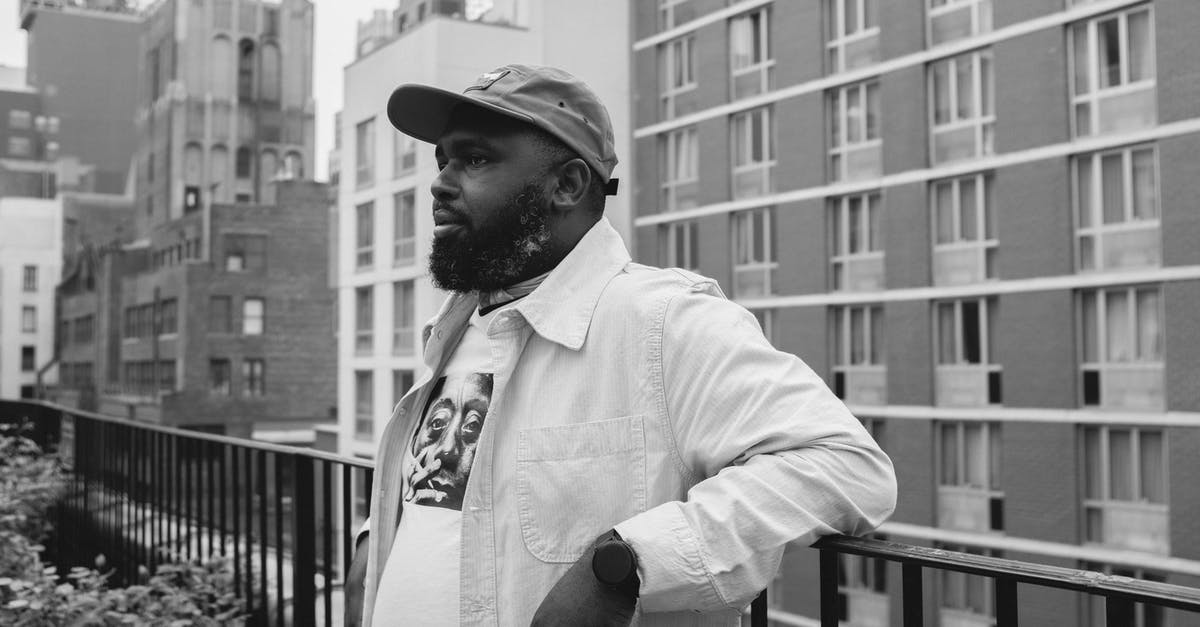 Is there a population cap for cities in SC4? - Black and White Portrait of a Man in a Cap Leaning on a Balcony Railing Is there a population cap for cities in SC4? - Black and White Portrait of a Man in a Cap Leaning on a Balcony Railing